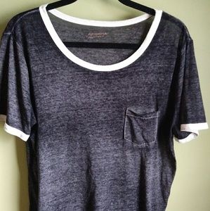 Basic black t-shirt with front pocket. See through